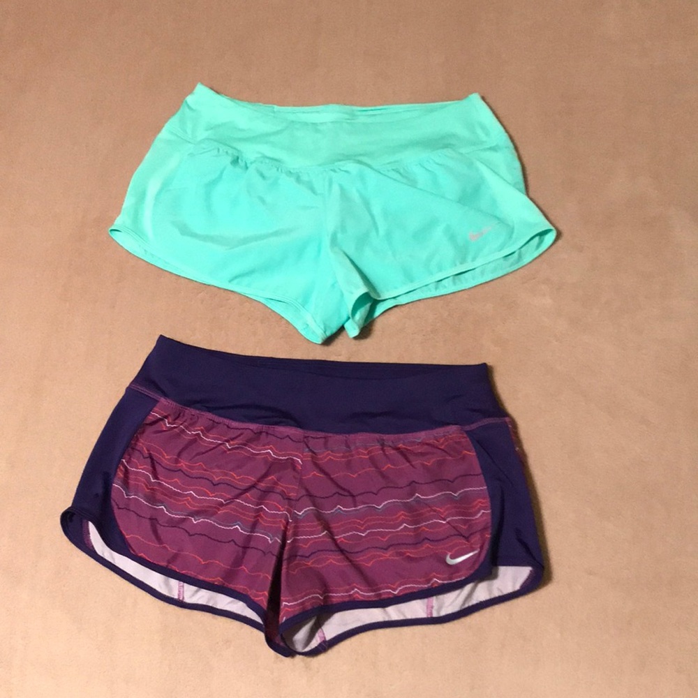Worn ONCE. 2 pairs of Nike Dri-Fit athletic shorts with built in briefs. Medium.